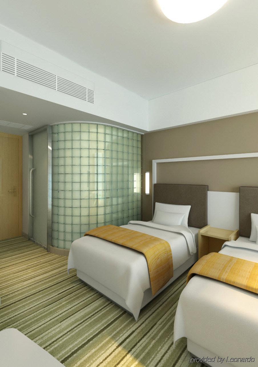 Holiday Inn Express Shanghai Nanhuizui Номер фото